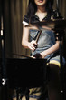Young woman playing drums