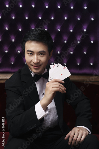 Photo: Man showing four Aces Man showing four Aces