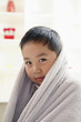 Boy with towel on his head