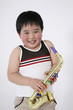 Boy playing saxophone