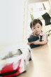 Photo: Boy playing with remote control toy car Boy playing with remote control toy car