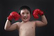 Foto: Boy with boxing gloves Boy with boxing gloves