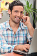 Man with computer at home