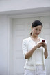 Woman text messaging on the cellphone
