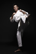 Photo: Man performing karate move Man performing karate move