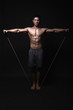 Man exercising with resistance bands