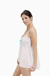 Woman in embroidered lace underwire chemise