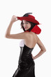 Woman in black vinyl lace gown