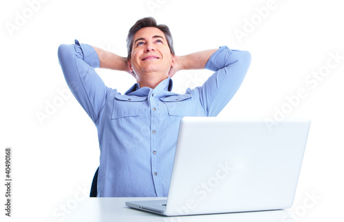 Photo: Handsome man with laptop computer. Handsome man with laptop computer.