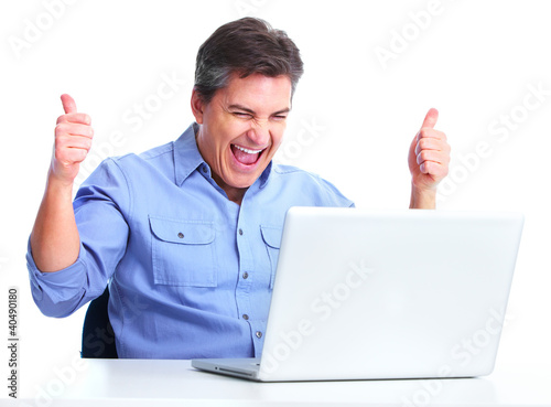 Foto: Handsome man with laptop computer. Handsome man with laptop computer.