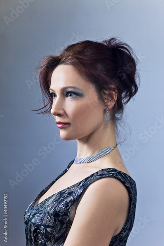 Photo: Portrait of the middle age woman . Portrait of the middle age woman .