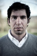 Natural portrait of a serious looking man