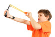 Concentrated boy with slingshot aim isolated on white background Concentrated boy with slingshot aim isolated on white background