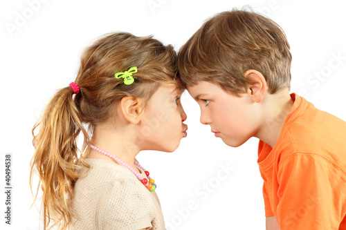 Photo: Brother and sister rested their foreheads and look at each other Brother and sister rested their foreheads and look at each other