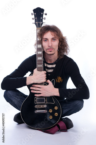 Foto: a man with a guitar a man with a guitar
