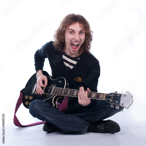 Photo: man with a guitar man with a guitar