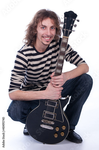 Photo: man with a guitar man with a guitar
