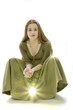 The girl with a lantern sits on a white background