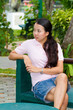 Distracted woman in park