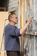 Man painting gate  Ukraine