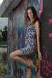 Slim girl against graffiti Slim girl against graffiti