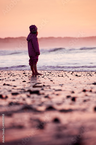Photo: Little girl in the beach Little girl in the beach
