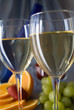 Clouseup of glasses of wine with oranges and grapes Clouseup of glasses of wine with oranges and grapes