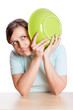 the girl is covered with a plate