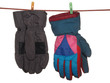 Two pairs of ski gloves isolated on white background