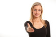 Pretty businesswoman reaching to shake hands