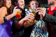 Foto: People with cocktails in bar or club People with cocktails in bar or club