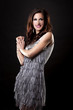 brunette and silver dress