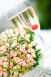 Luxury wedding bouquet of roses with champagne Luxury wedding bouquet of roses with champagne