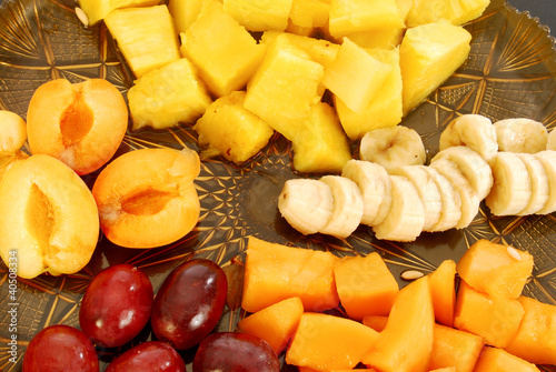 Photo: Colored plate of mixed fruit Colored plate of mixed fruit