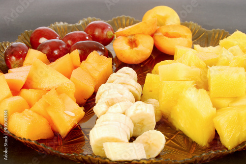 Photo: Colored plate of mixed fruit Colored plate of mixed fruit