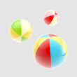 Three glossy colorful inflatable balls isolated