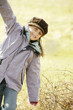 Girl running with arms spread