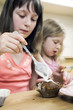 Kids learning baking