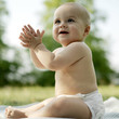 Baby boy clapping his hands