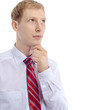 Portrait of a young business man looking depressed from work iso
