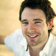 Man smiling happily