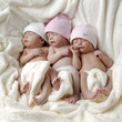 Three newborn babies