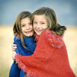 Foto: Sisters hugging each other Sisters hugging each other