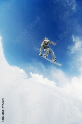 Photo: Male snowboarder in air Male snowboarder in air