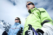 Two women getting ready for snow skiing
