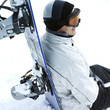 Man sitting with his snowboard
