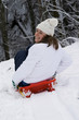 Woman snow sliding 