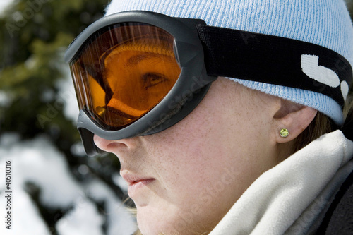 Photo: Close up of a woman wearing ski goggles Close up of a woman wearing ski goggles