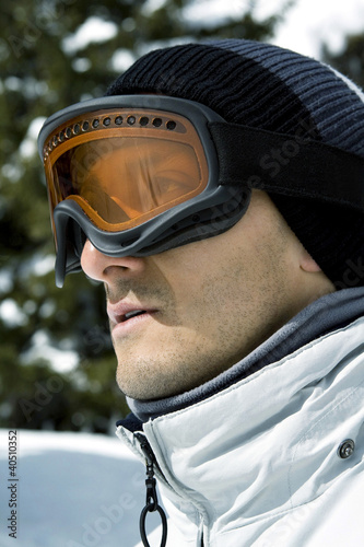 Photo: Close up of a man wearing ski goggles Close up of a man wearing ski goggles