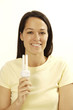 Woman with energy saving bulb